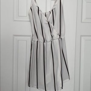 White with black striped romper